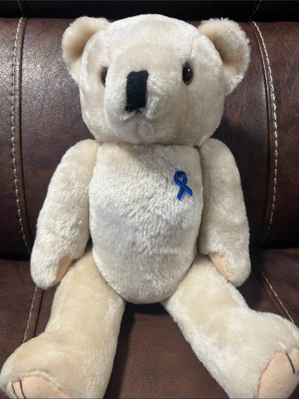 Plush Cream Teddy Bear with Blue Ribbon Pin